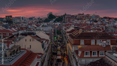 LISBON, PORTUGAL - JANUARY 19, 2025: bustling streets filled with people enjoying vibrant sunset and exploring historic architecture