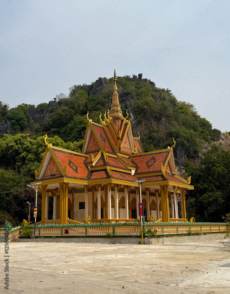 Majestic Caves and Mountains of Kampong Trach, Cambodia. Discover the awe-inspiring natural beauty of Kampong Trach, Cambodia, where dramatic limestone mountains surround a network of enchanting caves Majestic Caves and Mountains of Kampong Trach, Cambodia. Discover the awe-inspiring natural beauty of Kampong Trach, Cambodia, where dramatic limestone mountains surround a network of enchanting caves
