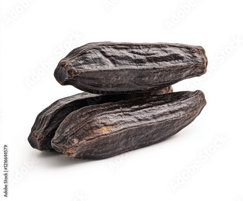 Wallpaper Mural Dark and aromatic tonka beans stacked for culinary use in desserts and beverages Torontodigital.ca