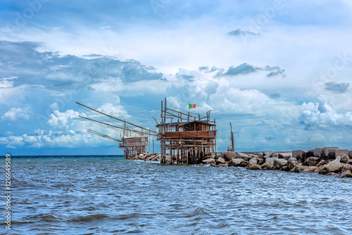 Obraz na płótnie Coast of the Trabocchi, Trabocco in Marina di San Vito Chietino. The Trabocco is a traditional wooden fishing house on pilework typical of Adriatic sea, coast of Abruzzo, Italy w salonie