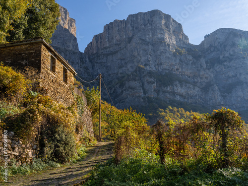 Fototapeta Naklejka Na Ścianę i Meble -  The narrow stone streets of mountain village Mikro Papigko in Mountains Epirus in Greece