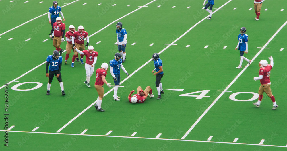 Red and Blue American Football Teams Battle for the Championship Trophy. Powerful Footballers Scoring Points. Gridiron Tournament Red and Blue American Football Teams Battle for the Championship Trophy. Powerful Footballers Scoring Points. Gridiron Tournament
