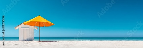 Tropical Beach House and Umbrella - Serene beach scene, white beach house, vibrant yellow umbrella, turquoise water, sunny sky.  Relaxation, escape, tranquility, summer, vacation. photo