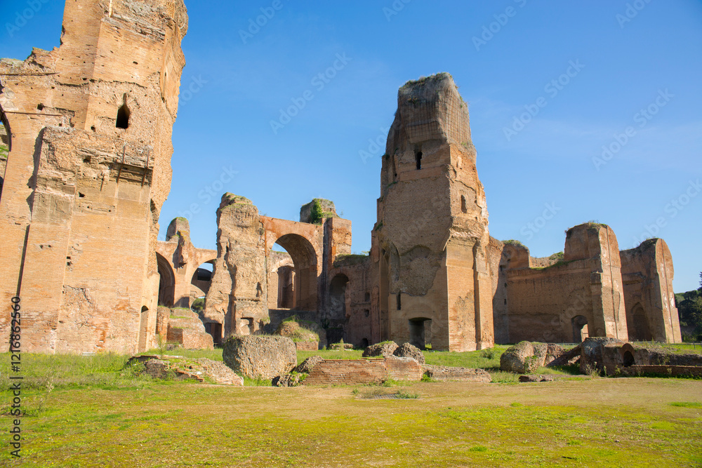Roman ruins at the Baths of Caracalla located in Rome, Italy. Today this Roman public baths, or thermae, are a tourist attraction. Roman ruins at the Baths of Caracalla located in Rome, Italy. Today this Roman public baths, or thermae, are a tourist attraction.