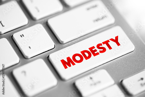 Modesty - the quality or state of being unassuming in the estimation of one's abilities, text concept button on keyboard photo