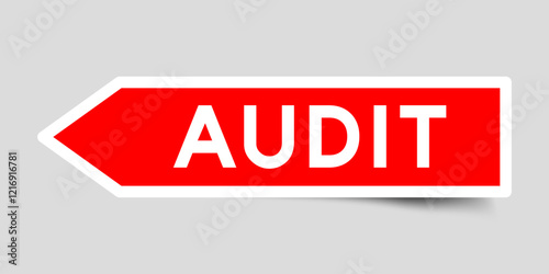 Red color arrow shape sticker label with word audit on gray background