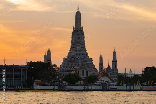 View of the Buddhist temple Wat Arun against the background of the senset sky, Bangkok photo