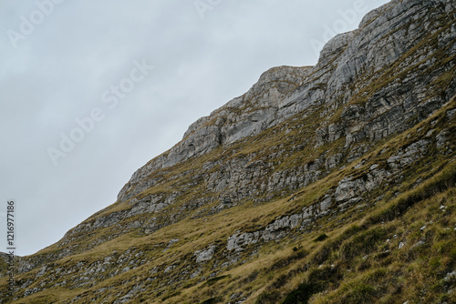 Montenegro country, Durmitor National Park. Saddle Pass. Alpine meadows in autumn season. Breathtaking mountain landscape. Traveling through wild non-urban places concept.