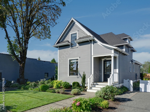 A traditional cottage in Oregon nestled in lush landscapes, offering a tranquil retreat.	
