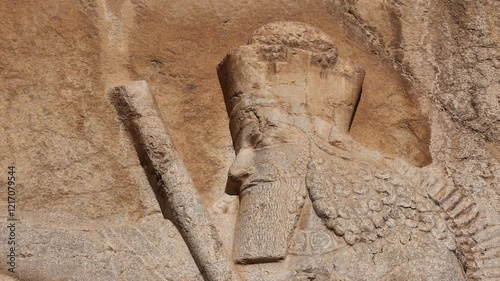 Naqsh-e Rostam necropolis of Persepolis in Fars Province with tomb of Darius I the Great, Iran. The tombs of the ancient Persian kings are decorated with bas-reliefs carved into the rocks