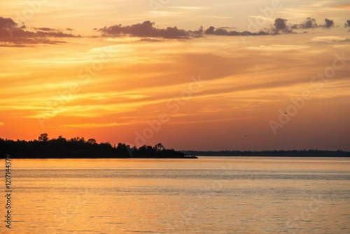 Gradual transition from soft golden to deep warm tones, calming atmosphere, abstract