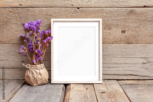 Wooden frame 8x10 on wooden background. Ideal for displaying your artwork.