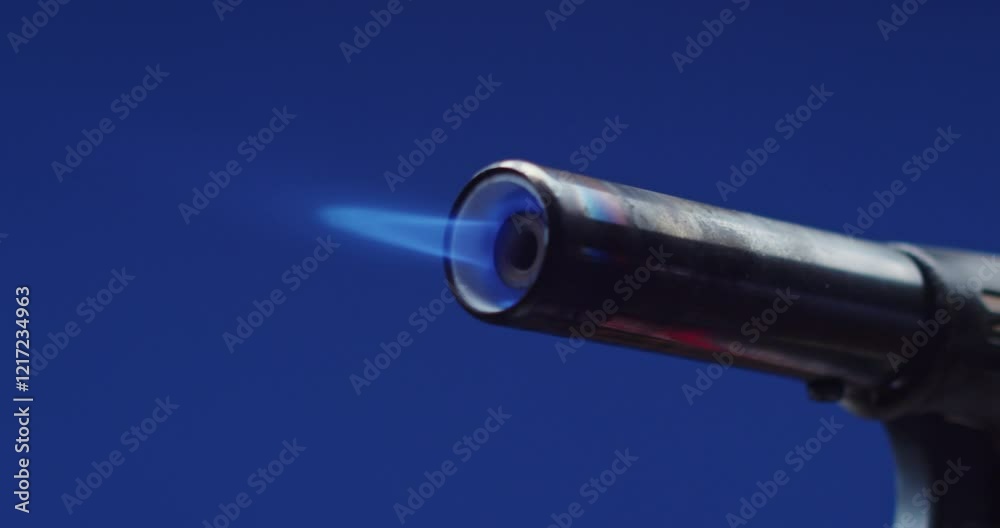 A CloseUp View of a flame gun, Gas burner, Hand burner A CloseUp View of a flame gun, Gas burner, Hand burner