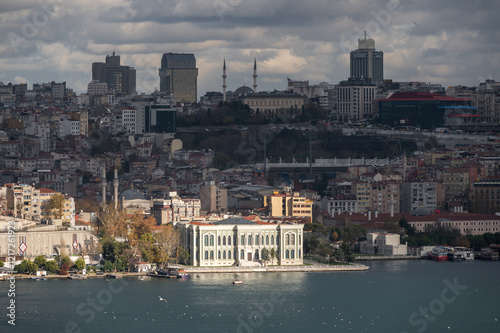 Panorama view of Istanbul from the Fatih district near the Yavuz Sultan Selim Mosque, Turkey. Golden horn, clouds, ferries and roofs photo