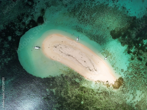 Aerial view ofnaked island in Siargao, Philippines, with a coral reef. High quality photo