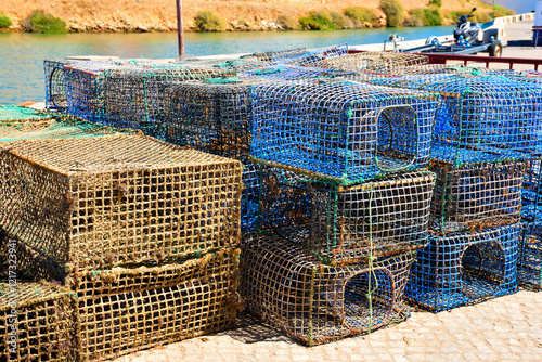 fish trap cages in ferragudo algarve portugal photo