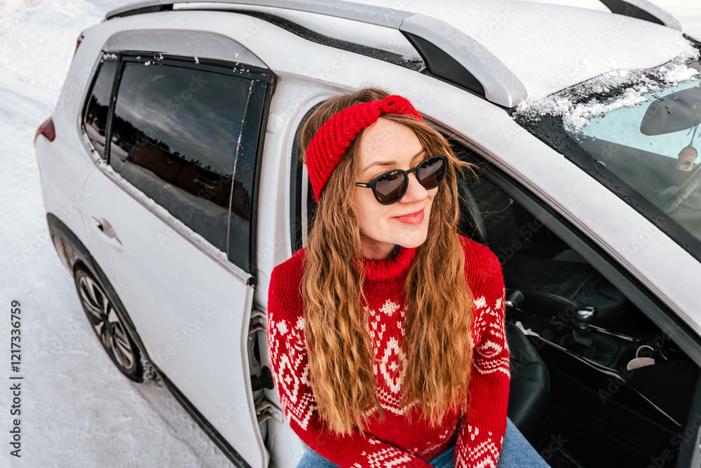 Woman Sitting in Car during Winter Road Trip