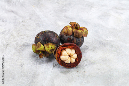 Sweet purple organic tropical mangosteen photo