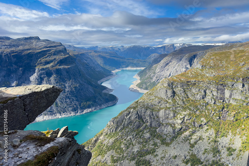 Embark on an unforgettable hike to Trolltunga, Norway's iconic cliff, where adventure meets nature in the heart of the Hardangerfjord region. 
