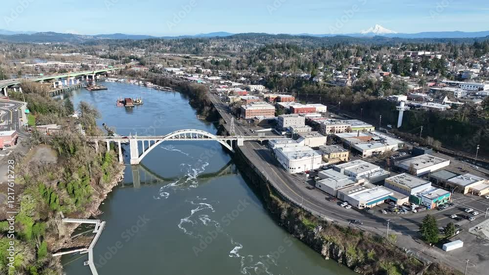 Completed in 1922, the Oregon City Bridge, also called the Arch Bridge, spans the Willamette River connecting West Linn and Oregon City, Oregon.