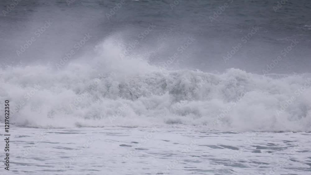 Big wave with splashes on the ocean coast