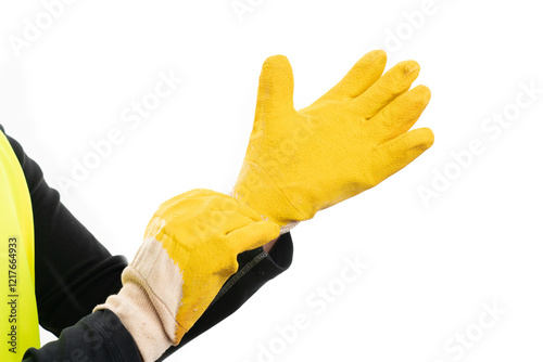 Close-up of male constructor putting on industrial work gloves