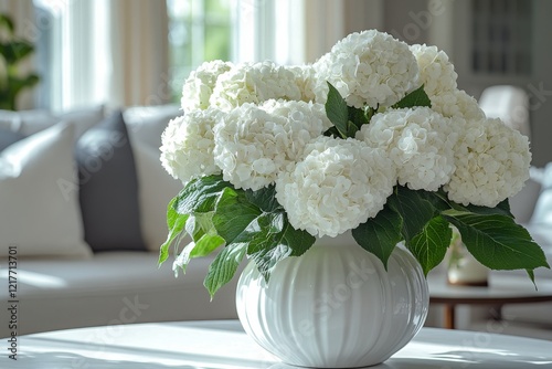 Elegant white flowers in a stylish vase displayed in a cozy living room setti...