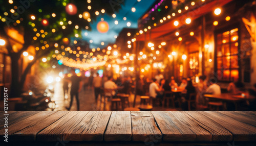 Wooden tabletop for product with view of city market street with people and lights hanging overhead