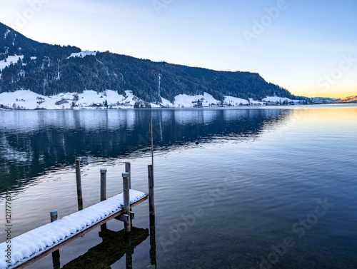 Winter Lake Aegeri behind Rigi and Pilatus, Gottschalkenberg, Canton Zug, Switzerland photo