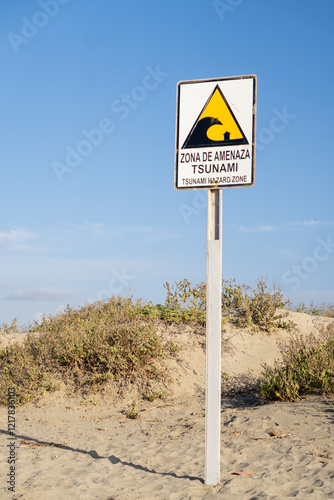 A warning sign on a beach in Spanish that reads 