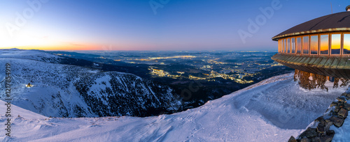 view on jeleniogorska valley at evening from Snezka summit at winter in Poland 