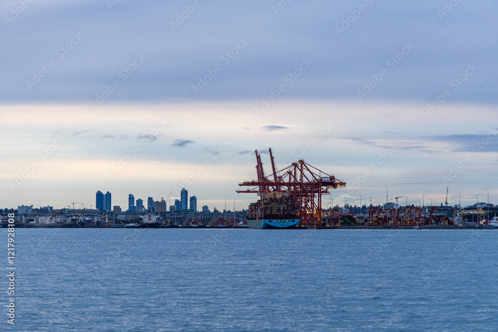 Fototapeta premium Shipping Port at Sunrise with Downtown Vancouver Skyline in Background