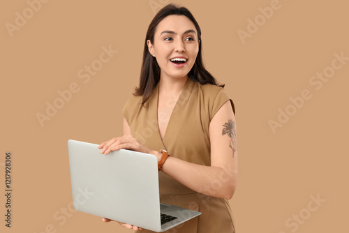 Pretty young woman with lap...