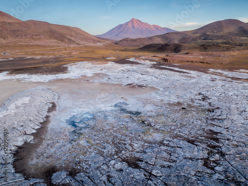 Salar del Carmen and Miniques volcano at San Pedro de Atacama, Chile photo