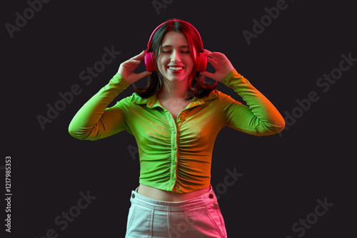 Young woman in headphones o...