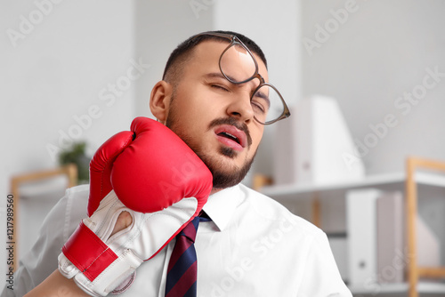 Young businessman getting h...