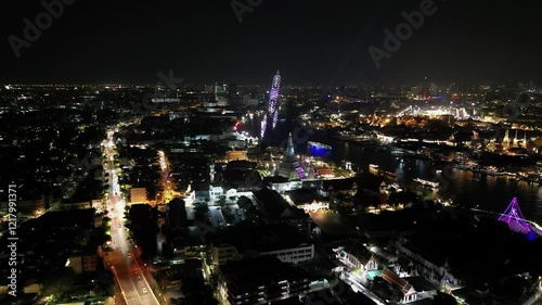 Wallpaper Mural Illuminated drone show in dark sky over Bangkok by Chao Phraya River Torontodigital.ca