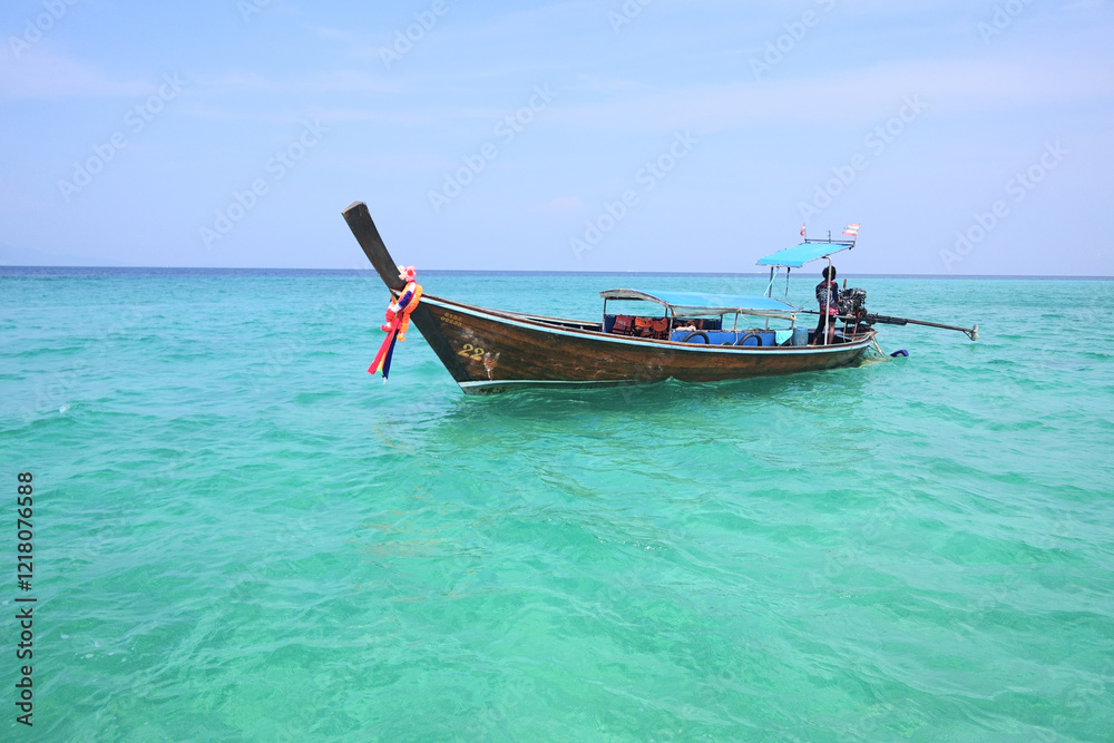 A long tail boat on the beautiful sea A long tail boat on the beautiful sea