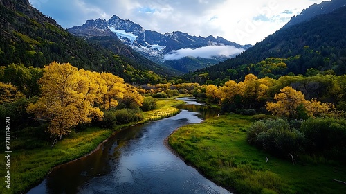 Autumn river valley, snow-capped mountains, fall foliage, scenic landscape, nature photography