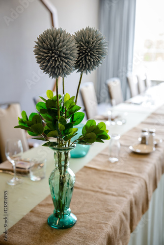 Elegant green floral decorations at wedding reception