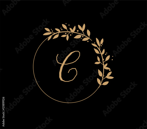 The logo has an elegant and classic design, with the main element being a monogram of the initials, such as the letters A and B, written using a calligraphy or serif font with fine details. The gold c