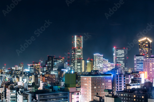 Obraz na płótnie sweet sunset winter and light illumination from Cityscape of Yokohama city, Skyline and office building and downtown in Minatomirai Area, Yokohama city port, Kanagawa, Japan w salonie