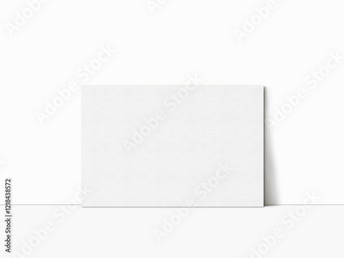 Horizontal canvas mockup lean against the white wall