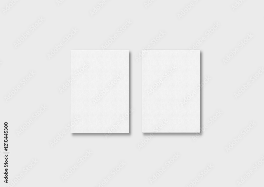 Fototapeta premium Two canvas hang on white wall mockup