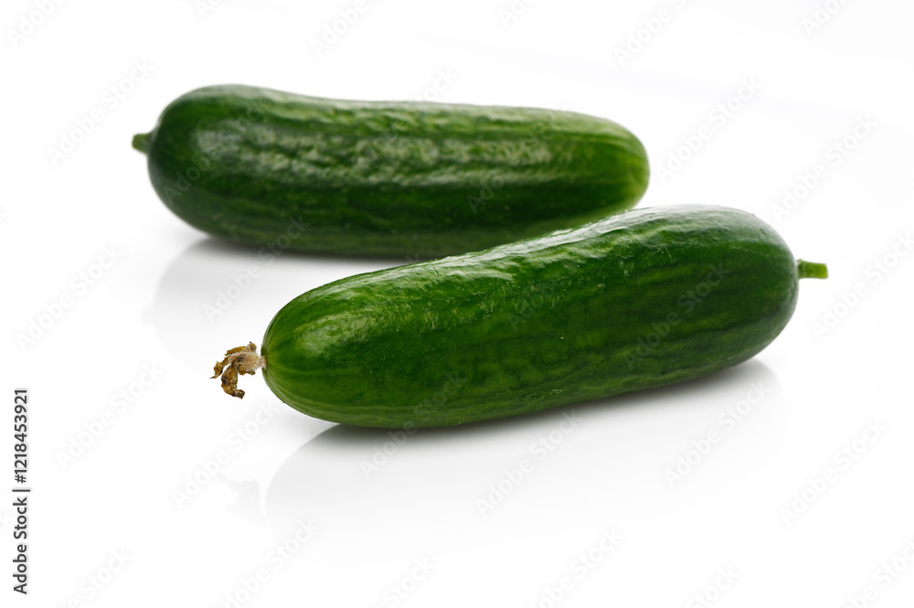 Freshly harvested cucumbers from the local farm ready for a delicious summer salad Freshly harvested cucumbers from the local farm ready for a delicious summer salad