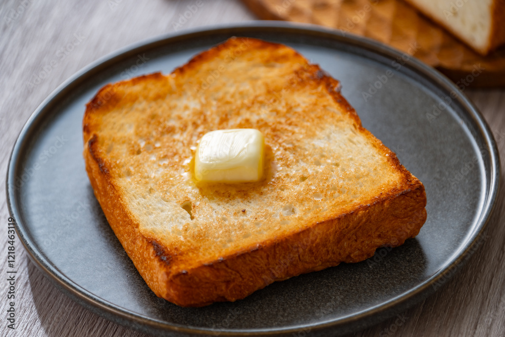 Buttered toast.
Delicious white bread image. Buttered toast.
Delicious white bread image.