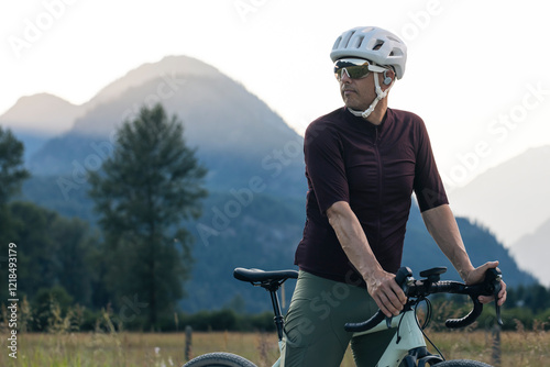 Cyclist in modern gear, focused and ready for outdoor adventure. photo