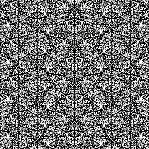 Wallpaper in the style of Baroque. Seamless vector background. White and black floral ornament. Graphic pattern for fabric, wallpaper, packaging. Ornate Damask flower ornament.