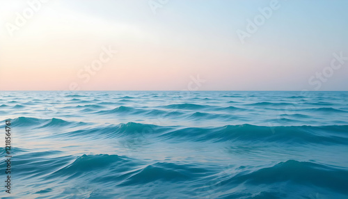 Wallpaper Mural Tranquil turquoise ocean waves under a pale pastel sky at sunset or sunrise Torontodigital.ca