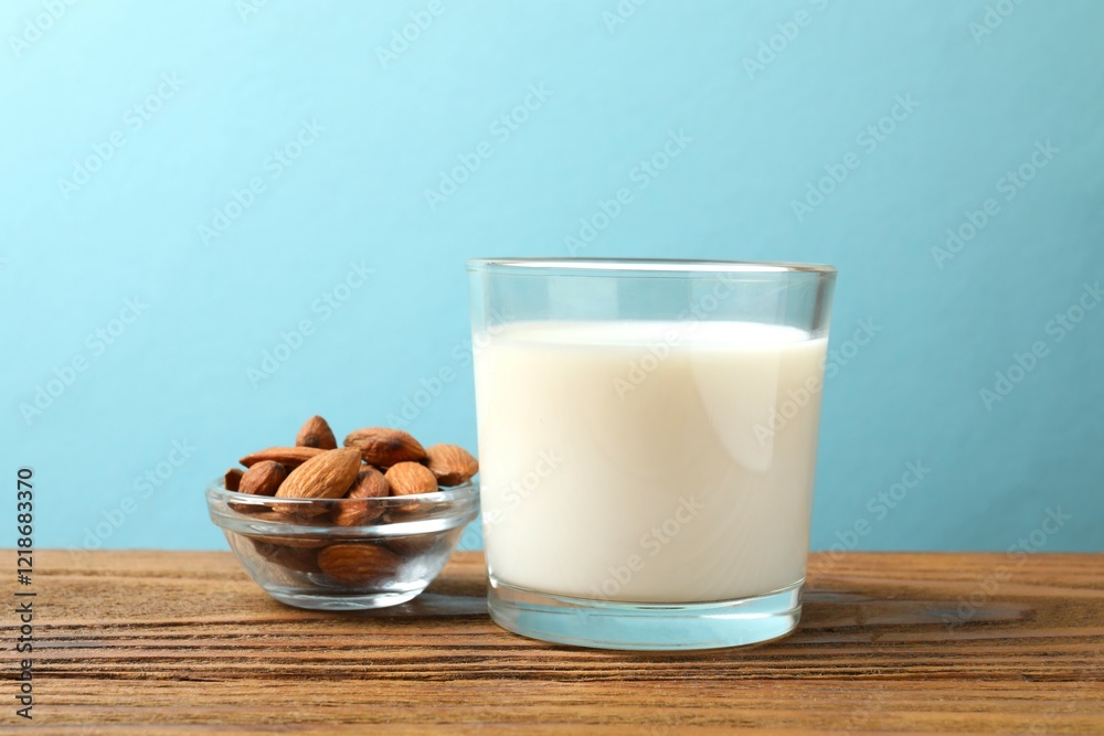 Glass of almond milk on the table Glass of almond milk on the table